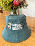 blue-kids-bucket-hat-cotton-sitting-on-bench