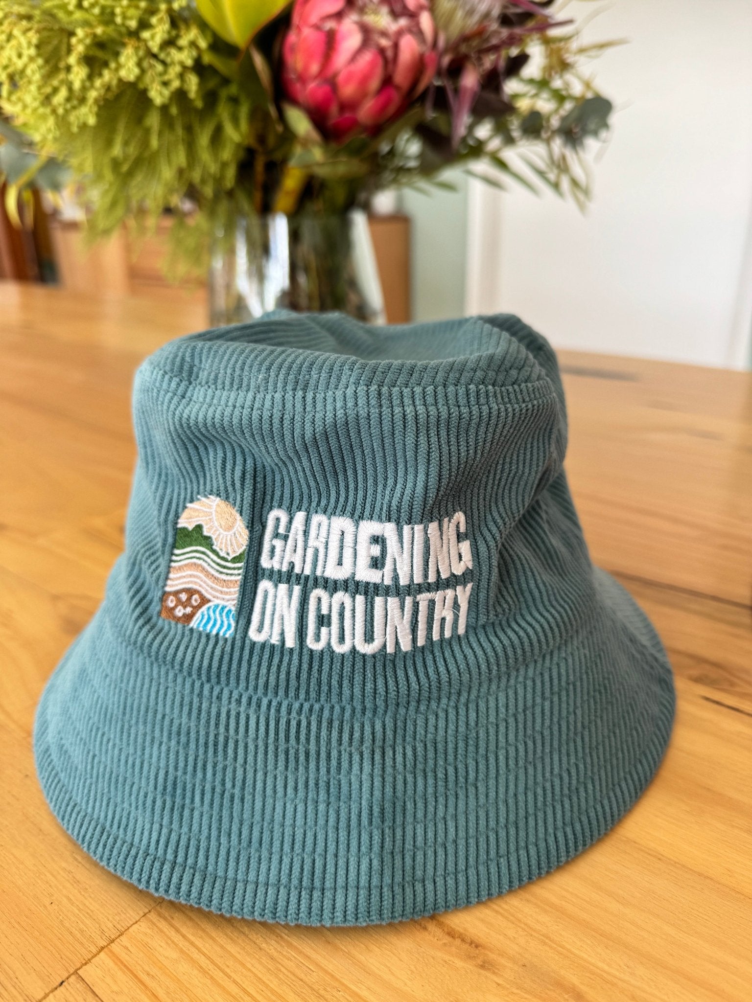 blue-kids-bucket-hat-cotton-sitting-on-bench