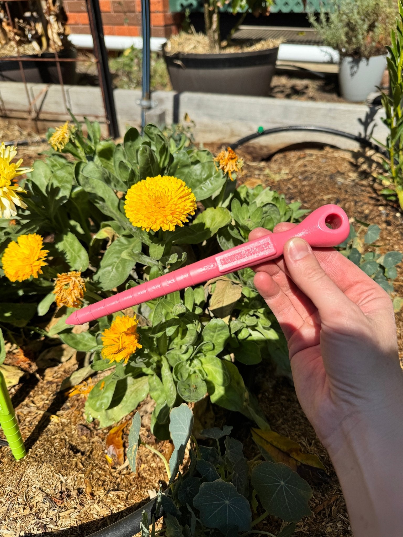 pink-dibbler-garden-tool-made-from-recycled-plastic
