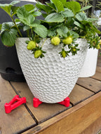 wedgie-pot-riser-recycled-plastic-red-4-pack-under-pot