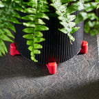 wedgie-pot-riser-recycled-plastic-red-4-pack-under-pot