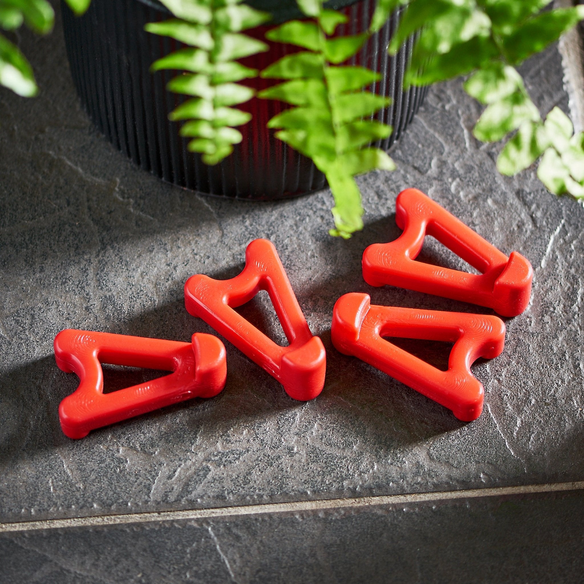 plastic plant pot risers Wedgie Pot Risers