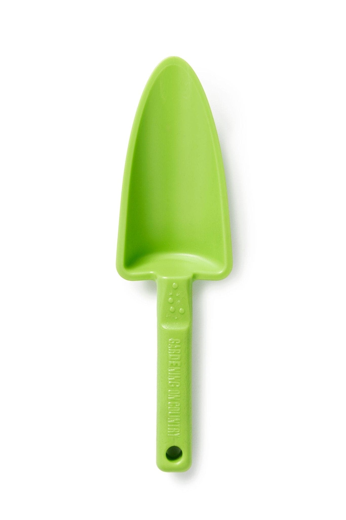 Green plastic garden shovel on a white background