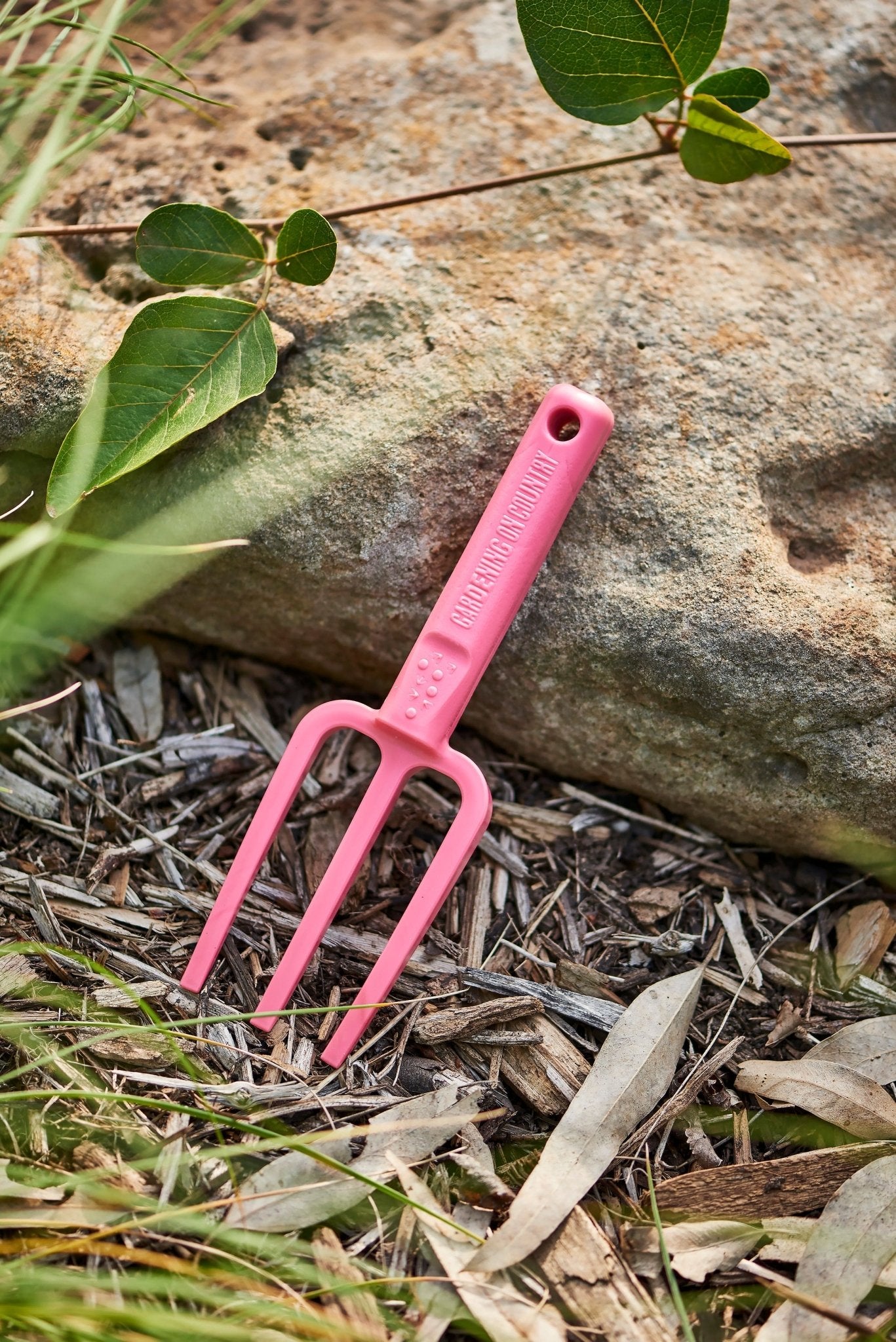 hand-fork-Chicky-kids-tool-pink-garden-view