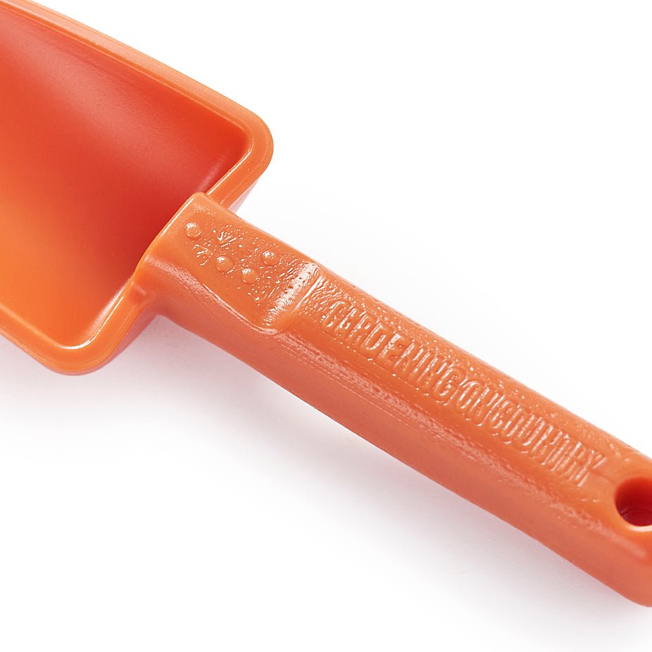 orange-kids-trowel-white-background-recycled-plastic-detailed-view