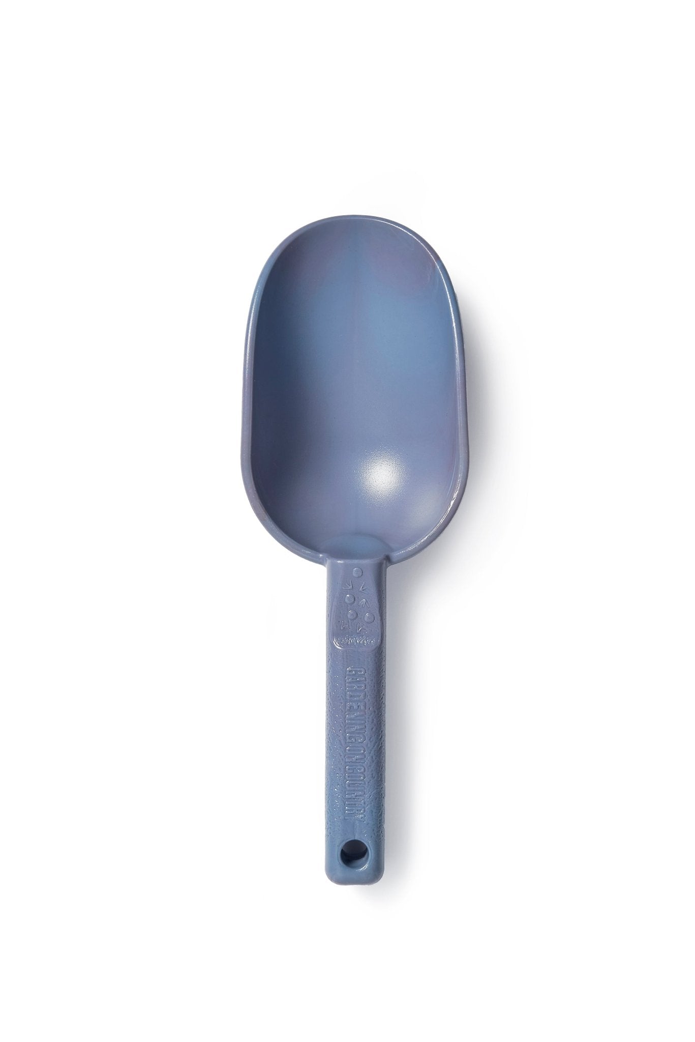 Purple plastic scoop on a white background