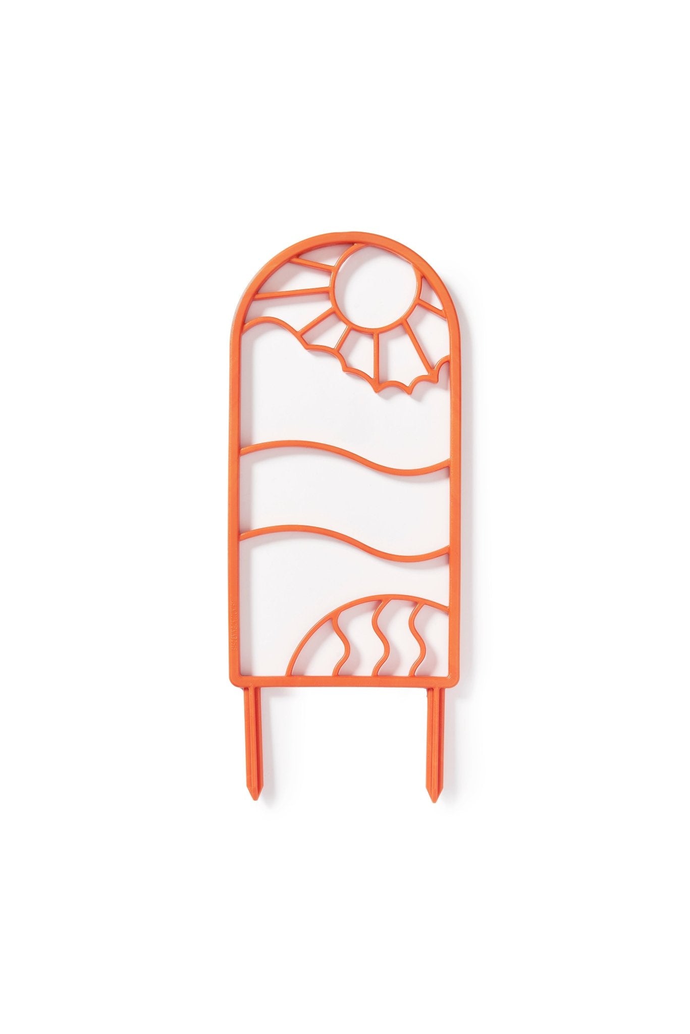 Decorative orange recycled plastic plant trellis with sun and wave design on a white background